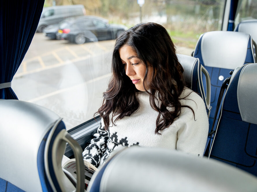 Women relaxing on our coaches | Longmynd Travel